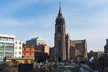 Obraz premium Myeongdong Catholic Cathedral locate at Myeongdong shopping street during winter sunny day at Jung-gu , Seoul South Korea : 2 February 2023