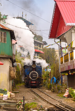 A Steam Engine of The Darjeeling Himalayan Railway, also known as the Darjeeling Toy Train entering to the Batasia Loop.