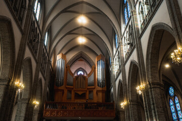 Obraz premium Pipe Organ Inside Myeongdong Catholic Cathedral during winter sunny day at Jung-gu , Seoul South Korea : 2 February 2023