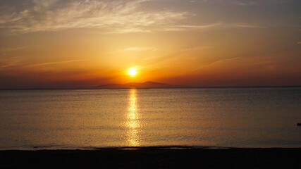 sunset seen from the boat 海から見た夕陽
