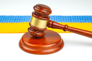 gavel of justice on the background of the Ukrainian flag