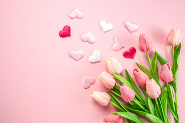 Pink flowers, hearts on pastel pink background. woman day. mothers day