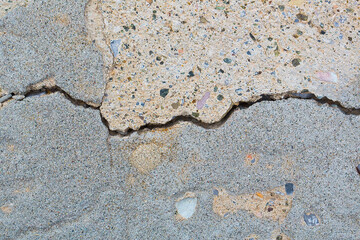 Cracked and damaged concrete wall