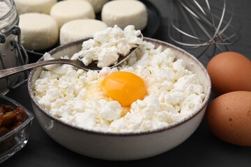 Different ingredients on grey table, closeup. Cooking cottage cheese pancakes