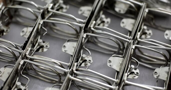 Metal chrome plated details for attaching folders closeup. Stationery archive organization and bound set