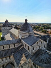 Fototapeta premium 2022.07.15 Italy, Pisa Cathedral of Santa Maria Assunta in Piazza dei Miracoli, evocative image of the back of the Cathedral seen from the top of the tower of Pisa under a clear sky