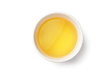 Top view of cooking oil in white bowl isolated on white background. Clipiing path.