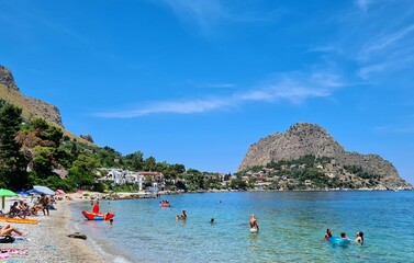 Fototapeta na wymiar evocative image of a sandy beach in Sicily in summer under a beautiful blue sky 