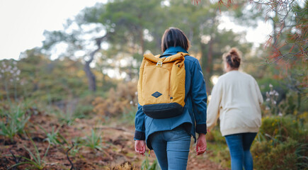 trip to Turkey, two women enjoy sunset over Fethiye city. Unity, mental health, eco travel. Hiking in mountains, travelling, good moments, digital detox