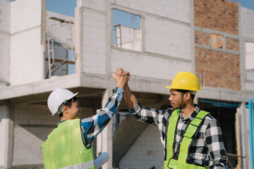 architects workers join hands to join forces to join forces to work for the industry for success. Teamwork and professional colleagues : Workers' hands, teamwork concept.