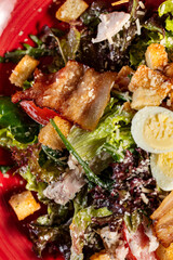 Caesar salad with chicken and bacon