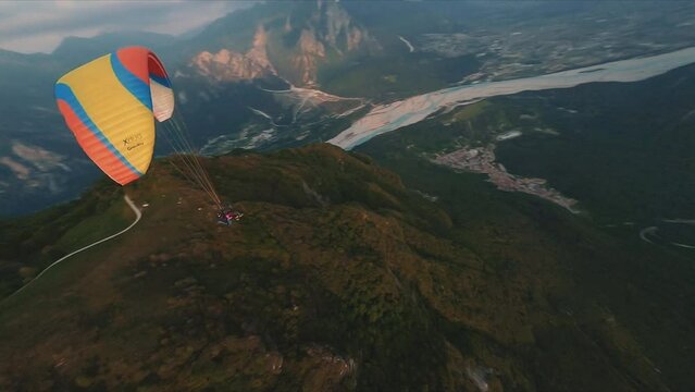 flying over the paraglider