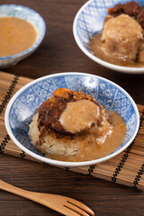 Migao, tube rice cake, rice pudding in a bowl, delicious Taiwanese street food.