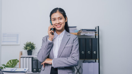 Using mobile smartphone, Young confident asia people entrepreneur ceo female business woman broker...