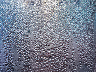 Water drops on the window as the texture background