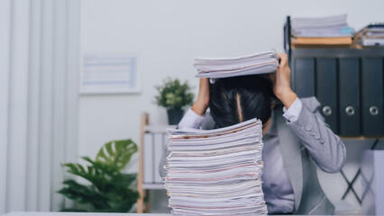 stressed, mad, out of control, Young confident asian business woman office worker people working with stack of papers, unfinished documents of bookkeeping.