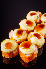 warm sushi roll with tuna and cheese cap