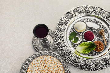 Composition with symbolic Passover, Pesach, items and meal on vintage background,