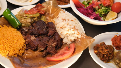 Paper kebab with appetizer and salad
