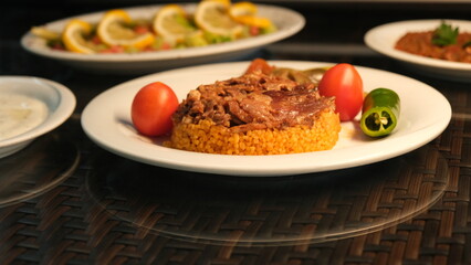 meat dish, rice and salad