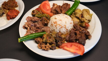 several meat dishes in one plate