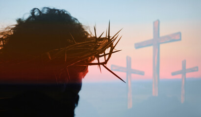 Christ Portrait with crown of thorns and Three Crosses On Calvary Hill - 586936112