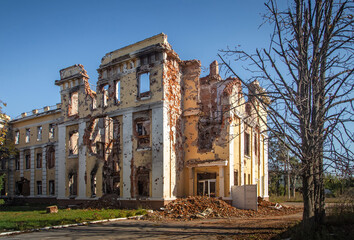 Destroyed and burned ukrainian school as a result of russian aggression against Ukraine. Kharkiv...