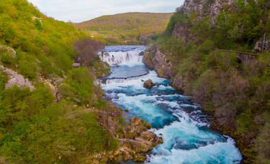 Fototapeta na wymiar Strbacki buk (strbaki buk) waterfall is a 25 m high waterfall on the Una River. It is greatest waterfall in Bosnia and Herzegovina