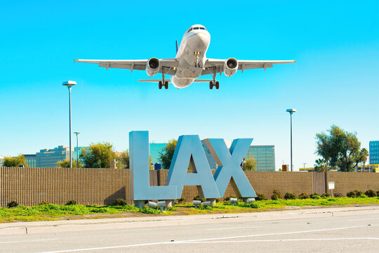 Los Angeles, California - February 1, 2023: Airplane landing above the LAX sign