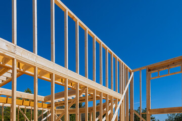 During construction, wooden framework was carried for beam stick home of layout joists trusses
