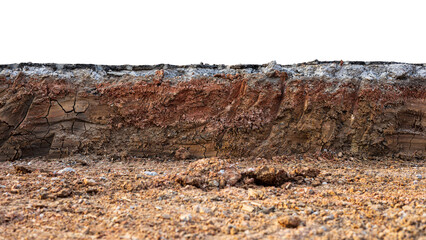 A cross-sectional view of the layer of soil beneath the paved road that was excavated and covered...