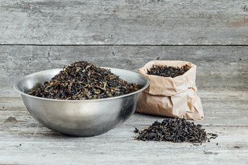 tea scattered on a wooden background. High quality photo ivan