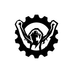 A man wearing hard hat lifting his arms in a victorious pose inside a gear