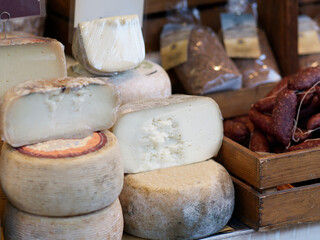 cheeses on typical farmer market. Selective focus