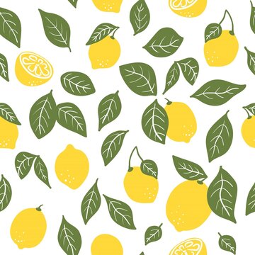 Tropical seamless pattern with yellow lemons and lemon slices. Hand drawn lemons pattern on white background. Fruit repeated background. Bright print for fabric, wallpaper, design, party paper.