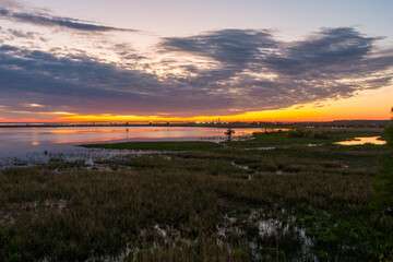 Mobile Bay and interstate 10 bridge at sunset in March