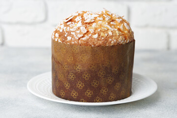 Easter cake with sugar powder on gray background