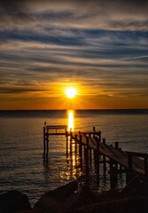 Fototapeta na wymiar Sunrise and fishing pier, Chesapeake Bay 