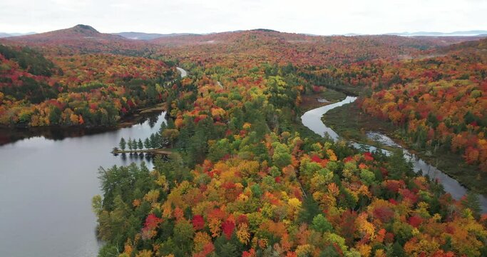 Aerial view of Bog River Falls near Tupper Lake in Adirondack Park in Upstate New York during fall.