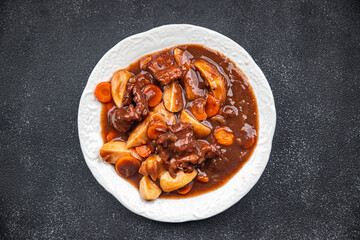 beef bourguignon meat dish with vegetables ready to eat healthy meal food snack on the table copy space food background rustic top view