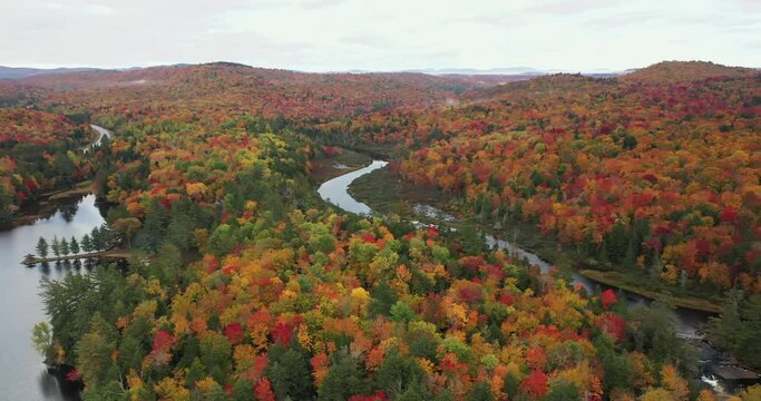 Aerial view of Bog River Falls near Tupper Lake in Adirondack Park in Upstate New York during fall.