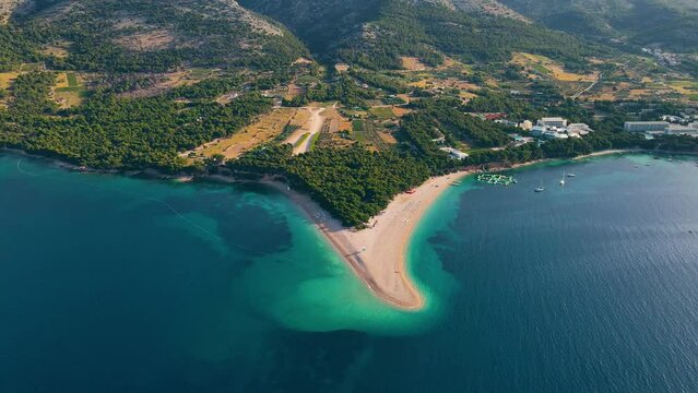 Aerial drone view of Zlatni Rat beach in Adriatic sea on Brac island, Dalmatia, Croatia. Summer vacation resort