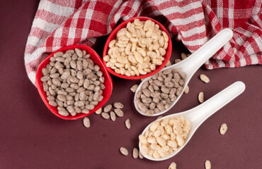 Roasted Crunchy Jowar and ragi - Indian Dietary Supplement, served in a bowl over moody background, selective focus.