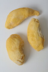 ripe durian fruit pulp closeup photo isolated on white