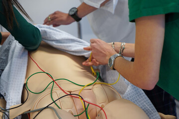 Nurses and emergency nurses undergo training at School of Medicine on emergency procedures and resuscitation.