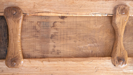 Rough wooden background frame. Light wood with scratches. Old brown rustic wooden boards texture