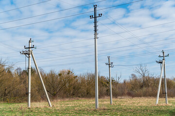 The line of electric poles with cables of electric