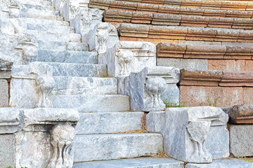 Marble steps in the Odeon, ancient theater ruins. Close up. Ascleion of Pergamum, ancient Greek and Roman sacred place and medical center. Bergama (Izmir region), Turkey (Turkiye)