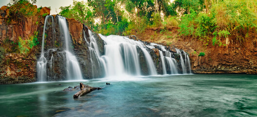 Beautiful Tad Low waterfall in Tad Lo village. Laos landscape. Panorama