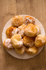 fragrant donuts sprinkled with powdered sugar